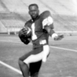 Michael Gordon Brainerd High School class of 1987 holding a football on the field in the chattanooga area