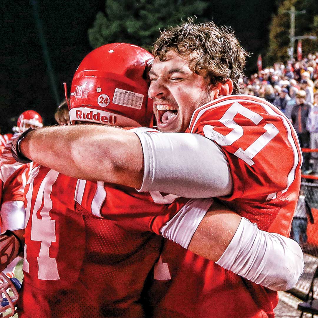 Football players rejoicing