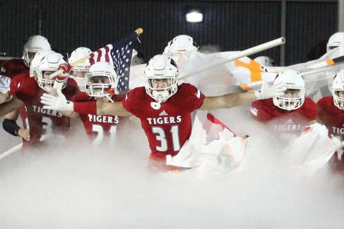Football players running