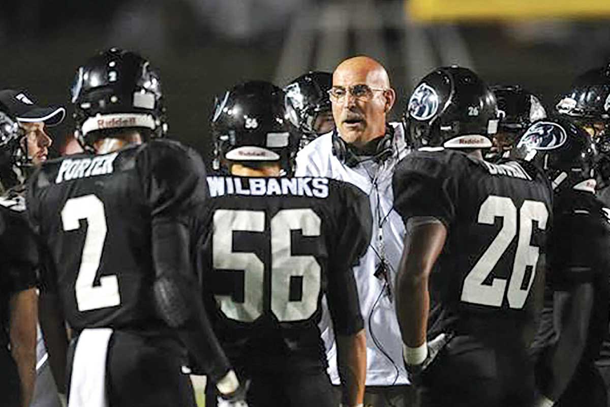 coach talking to players